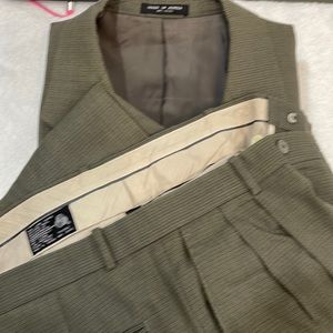 Mens 3 season 100% wool suit olive in color.